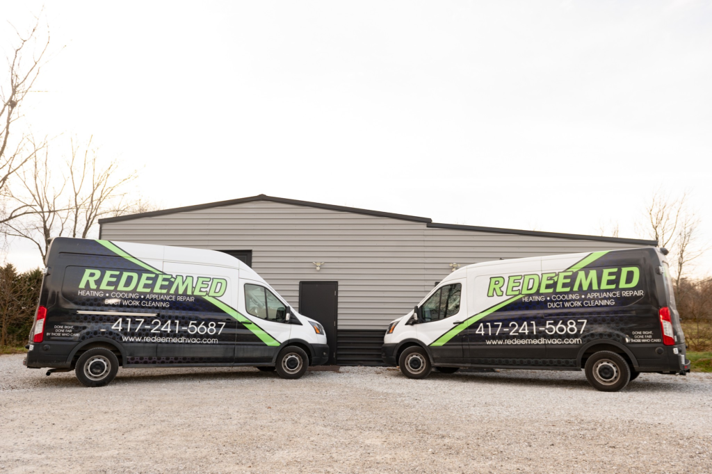 Redeemed HVAC & Plumbing service vans outside their Springfield MO shop